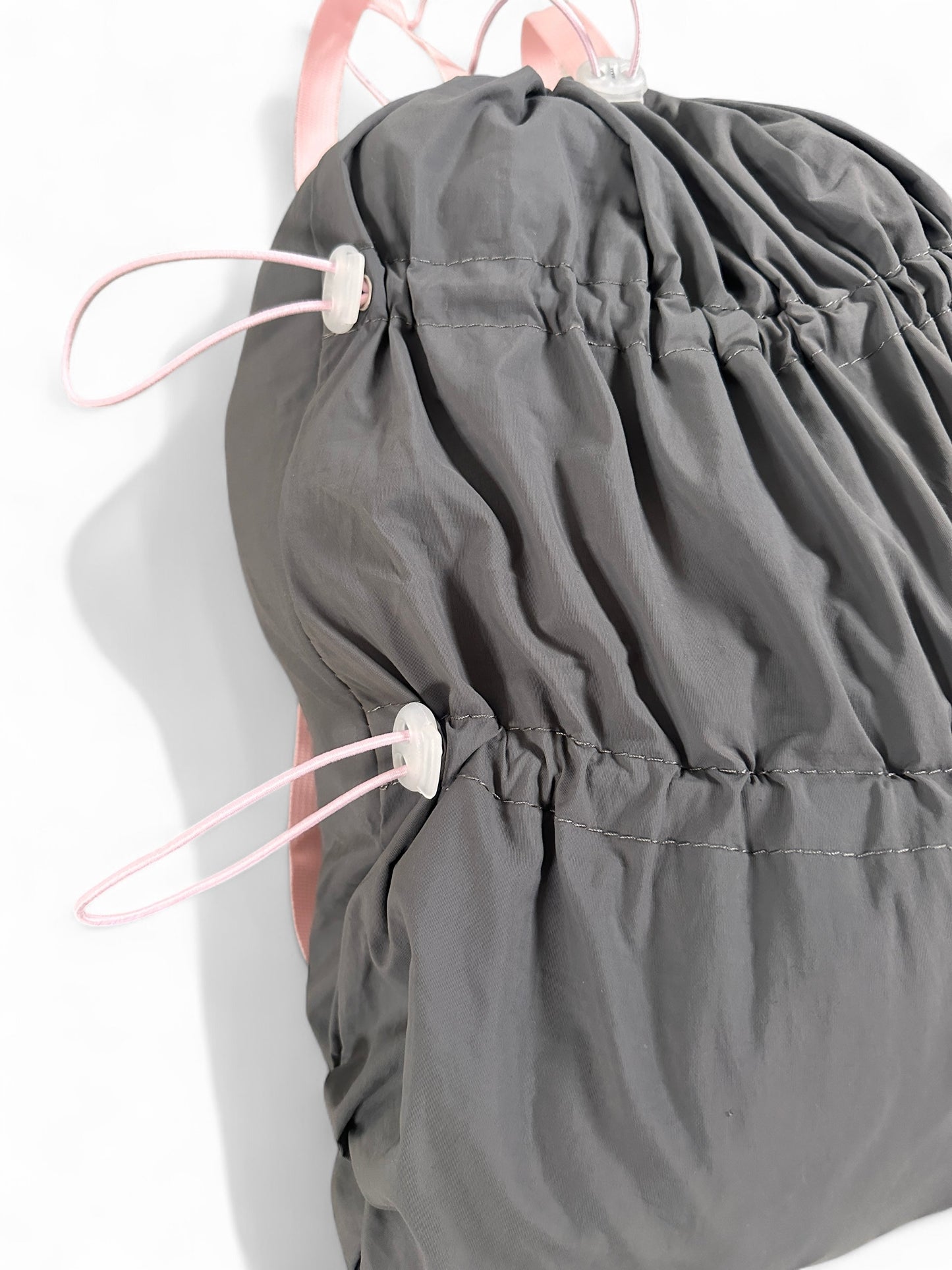 *Formula fully adjustable toggle/drawstring bag.