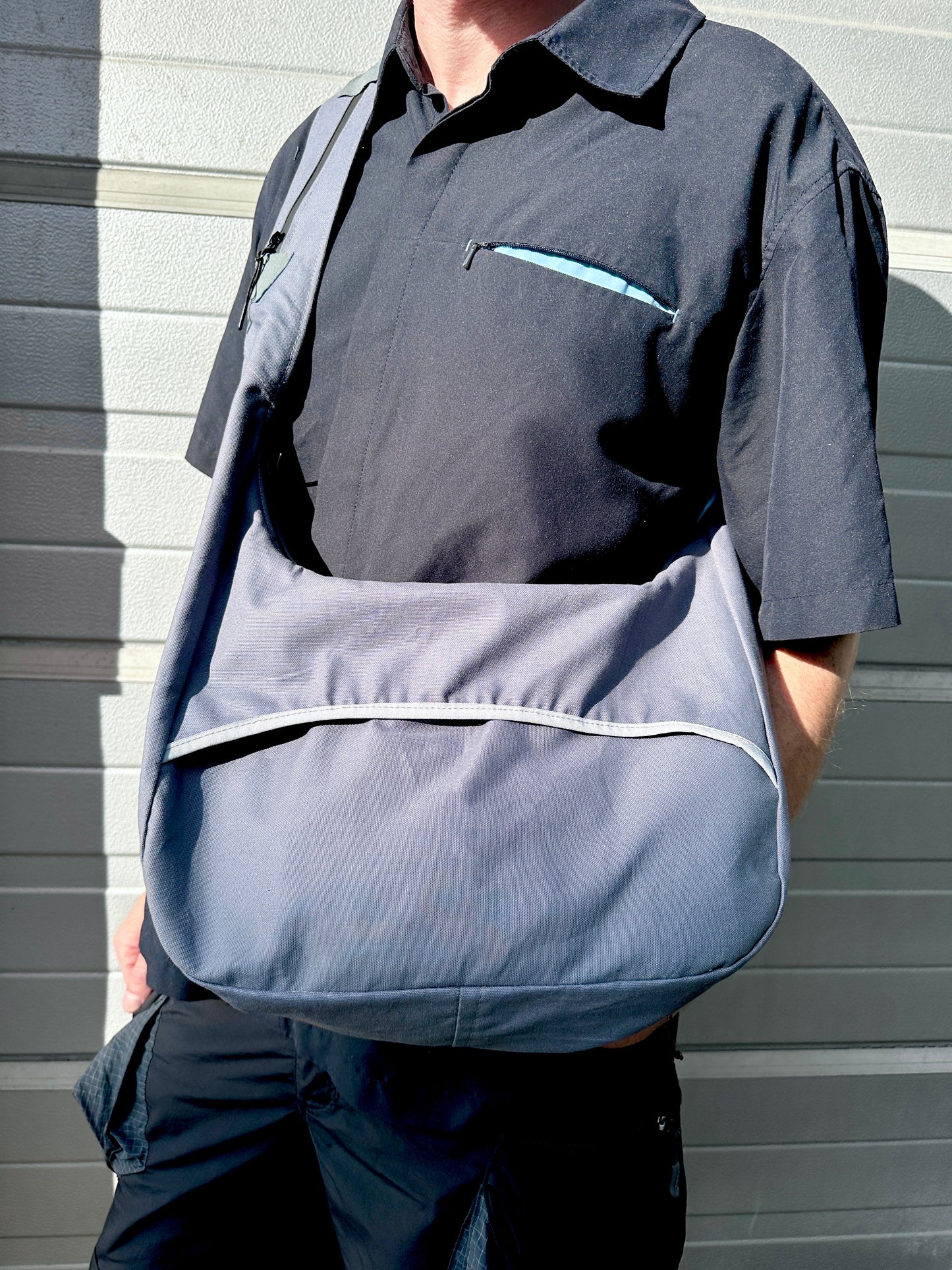 *Aspire treated canvas steel blue sling bag